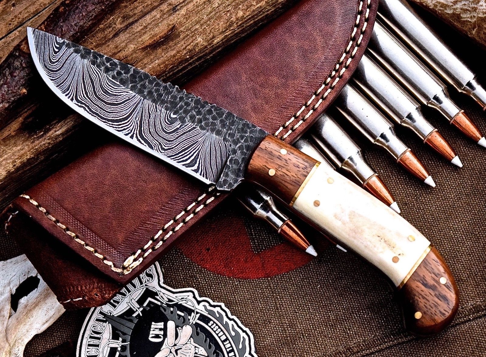 "Custom hunting knife with a hand-forged Damascus steel blade."
