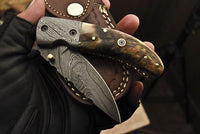 Damascus steel folding knife