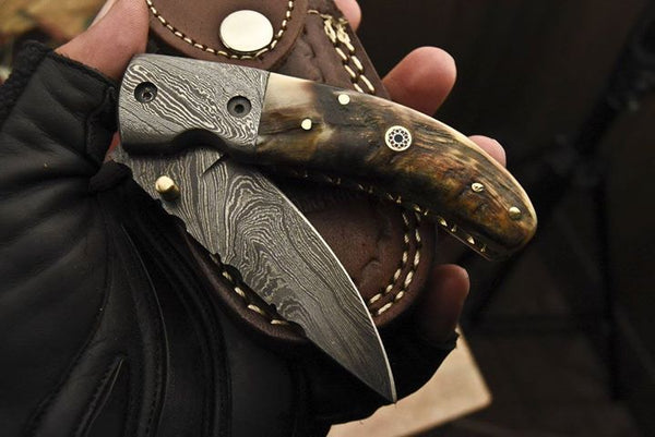 Damascus steel folding knife