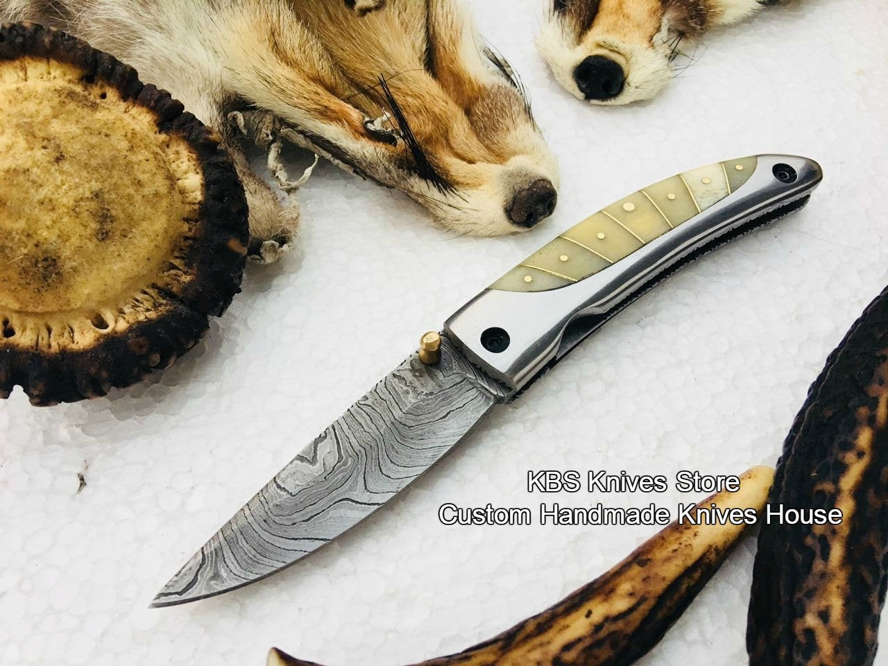[DAMASCUS_KNIVES], [HUNTING_KNIVES], [KNIFE], [HANDMADE_KNIVES], [SKINNING_KNIVES], [DAGGER_KNIVES], [TRACKER_KNIVES], [KITCHEN_KNIVES], [FOLDING_KNIVES] - KBS Knives Store