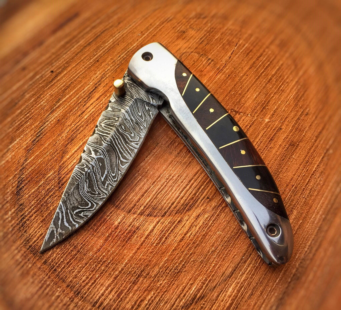 Premium leather sheath for the Everyday Carry Damascus steel pocket knife.