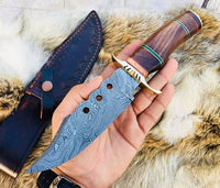 "Hunting knife with leather sheath for safe storage and transport."
