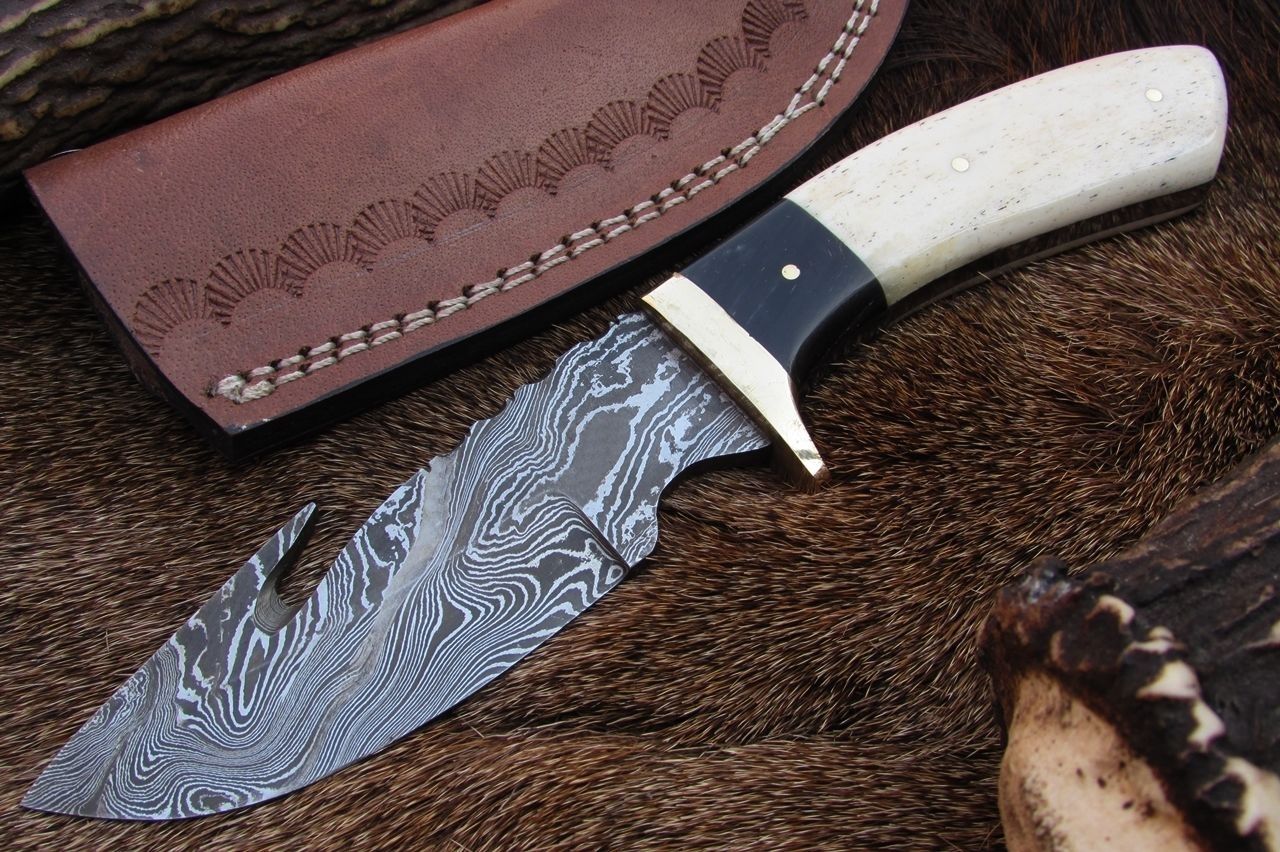 Hunter's Fixed Blade Guthook knife with custom Damascus steel blade and water buffalo horn/camel bone handle with brass guard
