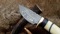 Damascus steel blade hunting knife with colorful sheets and brass guard
