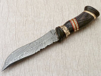Damascus hunting knife securely stored in a premium leather sheath