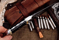 "Full view of the deer hunting knife with its protective leather sheath."
