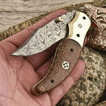 Damascus steel folding knife