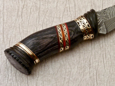 Close-up of 5.5-inch Damascus blade showcasing unique pattern