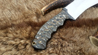 Unique fixed-blade knife for pig hunting with comfortable exotic wood grip
