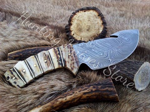 Deer Guthook knife with custom Damascus steel blade and antler horn handle with brass spacers
