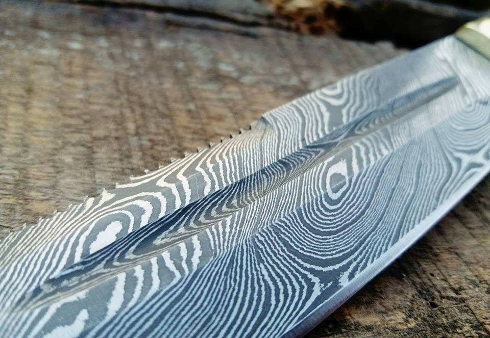 Damascus steel blade detail showing unique patterns and blood groove on Tanto Hunting Knife.