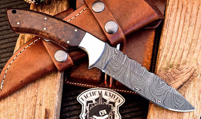 "Custom handmade Damascus steel hunting knife with rosewood handle."
