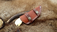 Full view of the 6.5-inch field dressing knife highlighting its craftsmanship.
