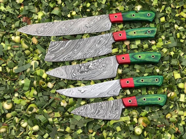 5-piece kitchen knives set with Twist Damascus steel blades and handles made from Exotic Color Wood. Perfectly stored in a leather roll for culinary excellence.