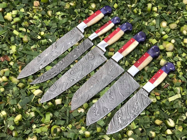 6-piece kitchen knives set with Twist Damascus steel blades, Exotic Wood, and Bone handles. Elegantly presented in a leather roll for culinary enthusiasts.