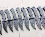 Everyday carry skinning knife with full tang Damascus steel blade and Damascus scales.
