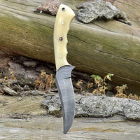 Bone handle skinning knife with full tang and razor-sharp blade.