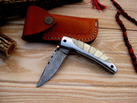 Bone and Steel Elegance pocket knife displaying its liner lock mechanism.