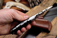 micarta handle fixed blade knife with steel bolster and leather sheath

