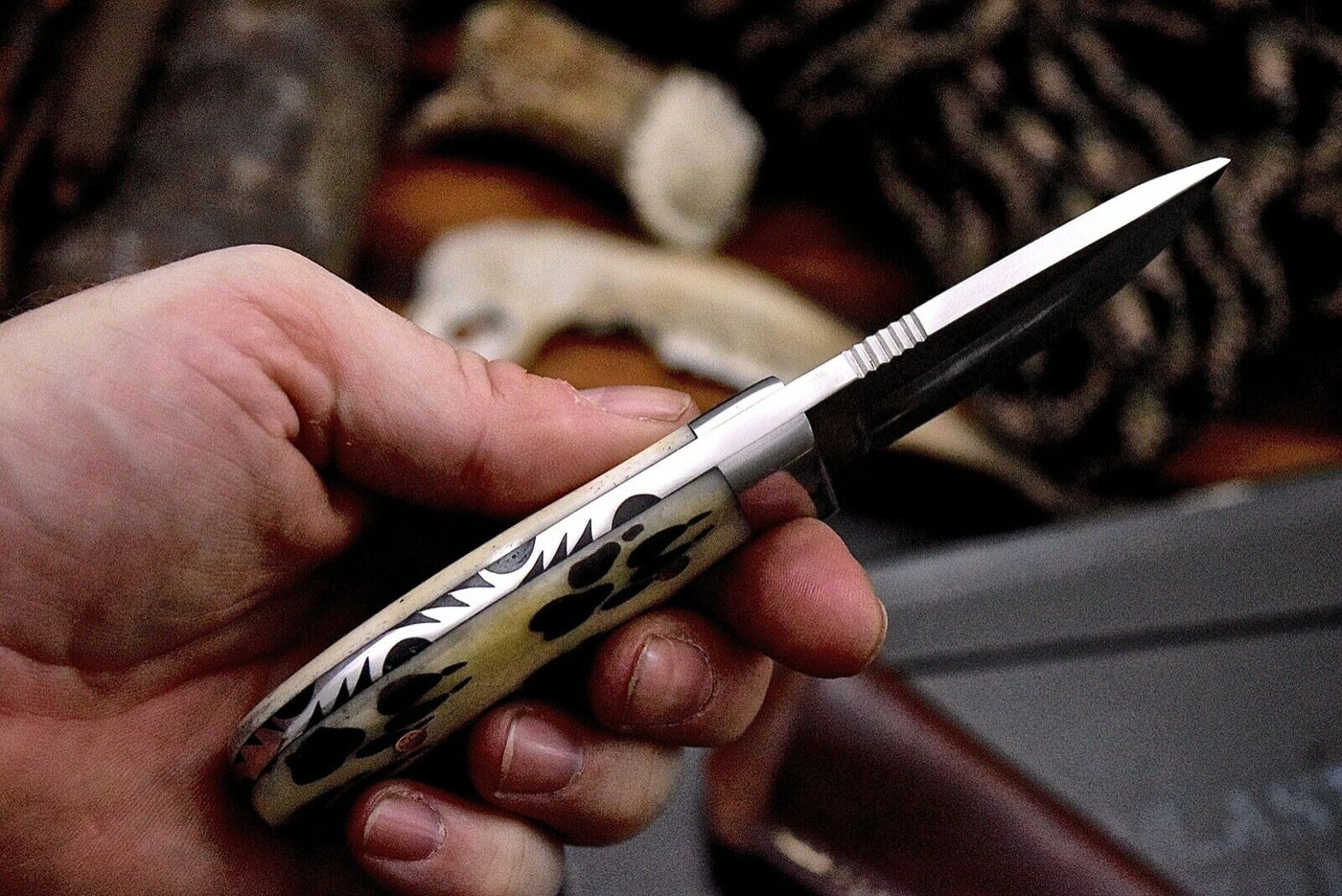Wolf paw tracks scrimshaw bone handle fixed blade hunting knife

