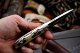 Wolf paw tracks scrimshaw bone handle fixed blade hunting knife

