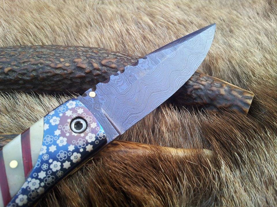 Custom handmade 3-inch Damascus steel blade with bone handle and leather sheath