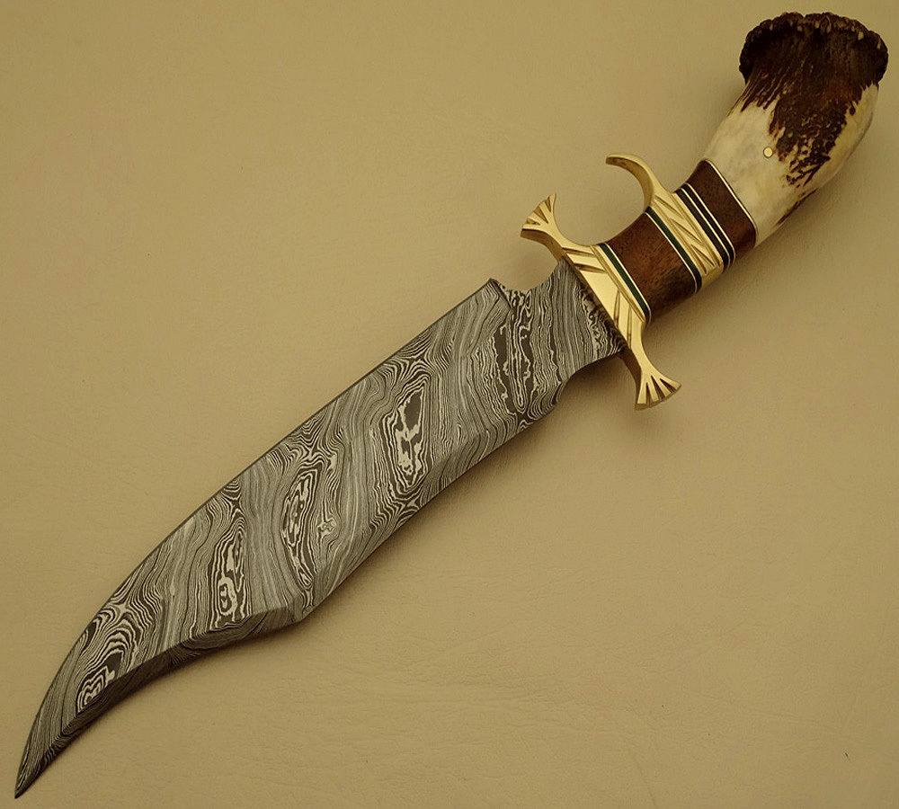 Damascus steel blade Bowie Knife with a rosewood handle and leather sheath