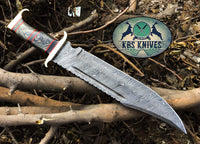 Detailed brass guards and red fiber spacers on the Western Outlaw Bowie Knife, showcasing fine craftsmanship