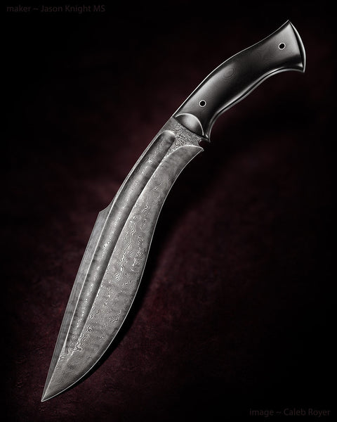 Best kukri with an 11-inch Damascus steel blade and black G10 handle.
