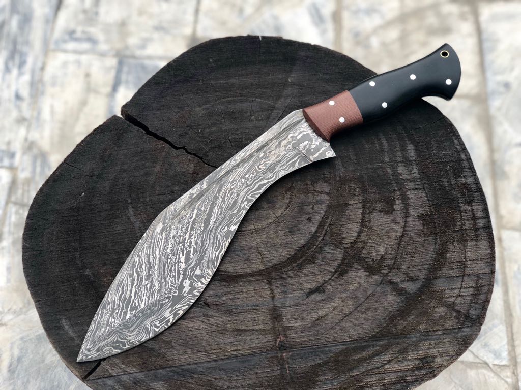 Full Tang Damascus Steel Gurkha Kukri with Blood Groove and G10 Handle.
