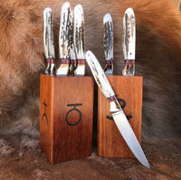 Enhance your outdoor dining experience with our 6-Piece BBQ Steak Knives Set, featuring robust D2 steel blades and distinctive Antler Horn handles with brass bolsters. Presented in a stylish wooden box, this set adds rustic elegance to every steak-cutting occasion.