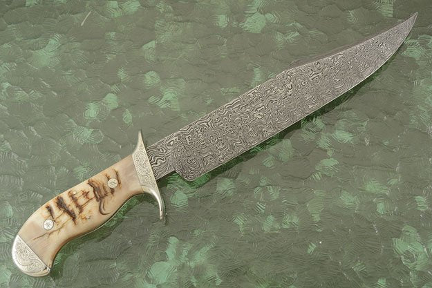 Leather sheath for the Hand Engraved Tennessee Bowie Knife, designed for secure and elegant storage