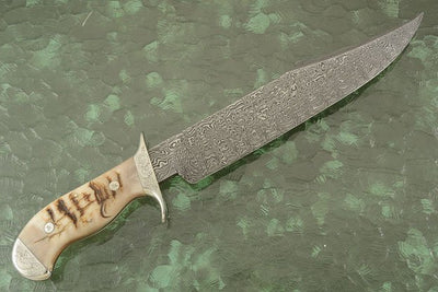 Leather sheath for the Hand Engraved Tennessee Bowie Knife, designed for secure and elegant storage