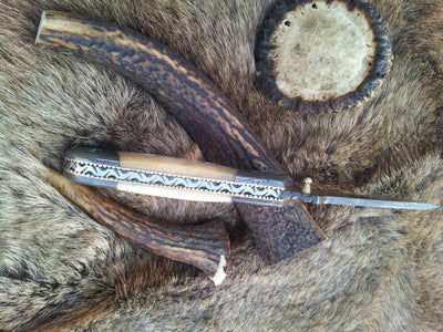Liner lock mechanism on The Titan Edge Damascus Steel Tanto Blade Folding Pocket Knife
