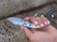 Liner lock mechanism on the Everyday Carry Damascus Steel Folding Pocket Knife