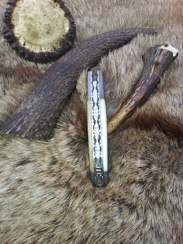 Liner lock mechanism on the Ivory Edge Damascus Steel Folding Pocket Knife