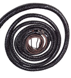 Bull whip measuring 8 feet from handle to end of braid, elegantly displayed in action.
