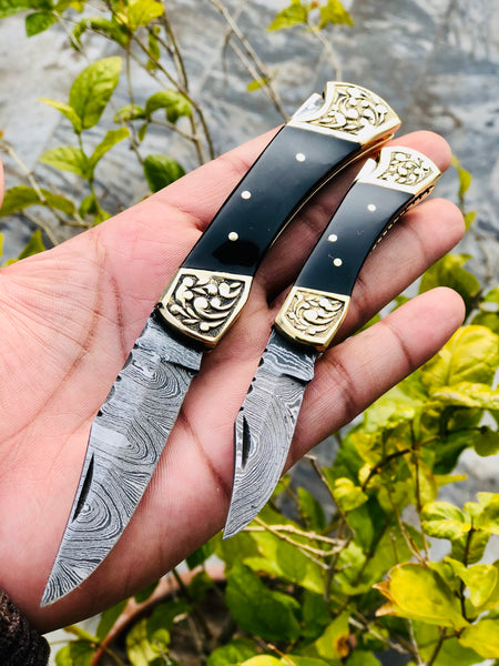 Pair of Custom Handmade Damascus Steel Folding Pocket Knives with Buffalo Horn and Engraved Brass Bolsters Handle