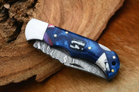 "Damascus Handmade Custom Folding Pocket Knife with Epoxy Resin and Steel Bolster Handle, 3-inch Blade Length, and Leather Case by KBS Knives Store"