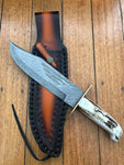 Custom handmade Western Bowie knife with 10-inch full tang Damascus steel blade and leather sheath.